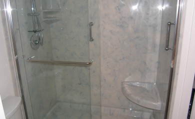 Cultured Onyx Shower with Glass Sliding Doors photo